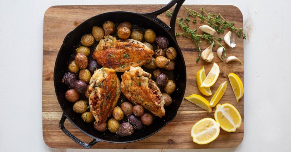 Pancetta Stuffed Airline Chicken Breast With Roasted Garlic Potatoes – Lodge Cast Iron