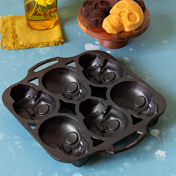 Forma mini teschio in ghisa + manici in silicone giallo