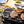 Load image into Gallery viewer, Sportsman's Pro Portable Cast Iron Charcoal Grill + A5-1 Starter Container LODGE Sportsman's Grill