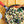 Load image into Gallery viewer, 30.48 Cm Seasoned Carbon Steel Skillet with Orange Silicone Handle Holder