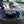 Load image into Gallery viewer, Φορητή μαντεμένια ψησταριά κάρβουνου Sportsman&#39;s Pro + A5-1 Δοχείο Εκκίνησης ψησταριά LODGE Sportsman’s
